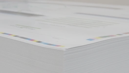 Supercalendered paper surface showing gloss and smoothness achieved with rovalrolls covers
