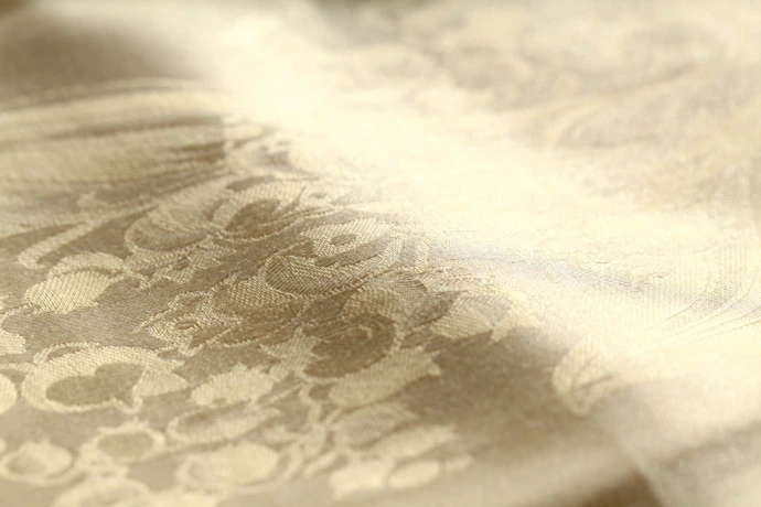 Textile fabric after calendering with rovalrolls elastic roll covers for soft hand and sheen finish
